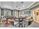 Spacious game room featuring a foosball table, gaming table, comfortable seating and modern decor at 9729 Lake Hugh Dr, Gotha, FL 34734