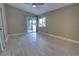 Bedroom featuring tile floors, ceiling fan, and sliding glass doors to the outdoor space at 126 Ingram Cir, Longwood, FL 32779
