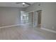 Bedroom features tile floors, access to the bathroom and a closet at 126 Ingram Cir, Longwood, FL 32779