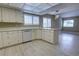 Bright kitchen with white cabinets, modern countertops, and stainless steel appliances at 126 Ingram Cir, Longwood, FL 32779