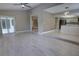 Open concept living room with a view to the kitchen featuring lots of natural light at 126 Ingram Cir, Longwood, FL 32779