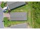 Bird's eye view showcasing a home with a well-kept yard, mature landscaping, and neighborhood charm at 1392 Lombardi Ct, Kissimmee, FL 34759