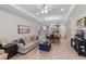 Comfortable living space featuring open floor plan with natural light, seamlessly connecting living spaces at 1392 Lombardi Ct, Kissimmee, FL 34759