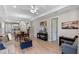 Spacious living area with open floor plan, connecting to kitchen and dining area at 1392 Lombardi Ct, Kissimmee, FL 34759