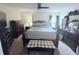 Cozy main bedroom suite with a ceiling fan, soft carpet, and ample closet space at 1713 Redfin Way, Kissimmee, FL 34759
