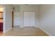 Bedroom featuring a large double door closet and light hardwood floors at 1862 Lorenzo Ln, Oviedo, FL 32765