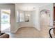 Light-filled dining area with views of the pool, adjacent to the kitchen at 1862 Lorenzo Ln, Oviedo, FL 32765