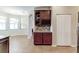 The kitchen features custom cabinets with dark hardware and a wine wrack at 1862 Lorenzo Ln, Oviedo, FL 32765