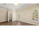 Bedroom with arched windows, hardwood floors, and a walk-in closet at 191 Villa Di Este Ter # 201, Lake Mary, FL 32746