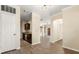 Entryway leading to an open-concept living space with a view of the kitchen at 191 Villa Di Este Ter # 201, Lake Mary, FL 32746