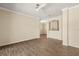 Spacious living room featuring hard surface floors and a view into the dining area at 191 Villa Di Este Ter # 201, Lake Mary, FL 32746