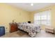 Cozy bedroom with tile floors, bright window and lots of light at 1910 Palm View Dr, Apopka, FL 32712