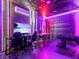 Finished basement with TV, air hockey, foosball, and LED lighting at 1999 Tropical Palms Cir, Kissimmee, FL 34747