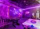 Finished basement with foosball table, air hockey table, and custom wall art at 1999 Tropical Palms Cir, Kissimmee, FL 34747