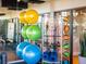 Fitness area with exercise balls, resistance bands, and foam rollers for a complete workout at 1999 Tropical Palms Cir, Kissimmee, FL 34747