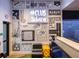 Trendy game room/club area with colorful wall art and comfortable seating at 1999 Tropical Palms Cir, Kissimmee, FL 34747