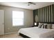 Cozy bedroom featuring modern decor and a comfortable bed at 228 Primrose Dr, Davenport, FL 33837