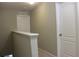 Hallway with a white door at 228 Primrose Dr, Davenport, FL 33837