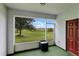 Screened lanai with view of landscaped yard, a tranquil escape at 228 Primrose Dr, Davenport, FL 33837