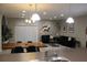 Open-concept living and dining area filled with light and modern furnishings at 228 Primrose Dr, Davenport, FL 33837