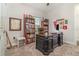 This home office has a large, executive desk and shelving units loaded with books and accessories at 2342 Clemblue Rd, Clermont, FL 34715