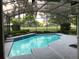 Relaxing screened pool with great views of manicured backyard at 2435 Sweetwater Country Club Place Dr, Apopka, FL 32712