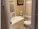 Neat bathroom featuring vanity, toilet, and shower with neutral decor at 2808 Manatee Rd, Tavares, FL 32778