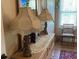 Bedroom featuring two lamps and decorative dresser with a window view at 2808 Manatee Rd, Tavares, FL 32778