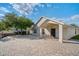 Paver patio, beautiful landscaping, and exterior view of a home's rear elevation at 2830 Alton Dr, Kissimmee, FL 34741