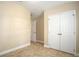 Open bedroom area with large closet and neutral paint at 2830 Alton Dr, Kissimmee, FL 34741