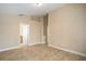 Spacious bedroom with neutral tones and en-suite bathroom at 2830 Alton Dr, Kissimmee, FL 34741