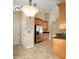 Well-equipped kitchen with stainless steel appliances and warm wood cabinets at 2830 Alton Dr, Kissimmee, FL 34741