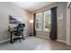 Bright home office featuring a modern desk, comfortable chair, and large windows for ample natural light at 3223 Blazing Star Ln, Harmony, FL 34773