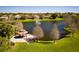 An eye-level shows a gazebo in a park with a pond with a fountain, perfect for community gatherings at 390 Anessa Rose Loop, Ocoee, FL 34761