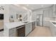 Spacious kitchen featuring stainless steel appliances, a wine cooler, and a large center island at 390 Anessa Rose Loop, Ocoee, FL 34761