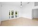 Bright dining area with tile floors and sliding glass doors to the outdoor space at 4102 Boca Woods Dr, Orlando, FL 32826
