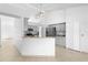 Modern kitchen features gray cabinets, granite countertops, and stainless steel appliances at 4102 Boca Woods Dr, Orlando, FL 32826