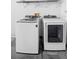 Laundry room with new front load washer and dryer units at 4102 Boca Woods Dr, Orlando, FL 32826