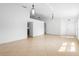 Bright living room featuring neutral paint, tile flooring, and pendant lighting at 4102 Boca Woods Dr, Orlando, FL 32826