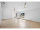 Spacious living room with neutral walls, tile flooring, and lots of natural light at 4102 Boca Woods Dr, Orlando, FL 32826