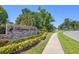 Stone sign at the entrance to Regency Park community at 4102 Boca Woods Dr, Orlando, FL 32826