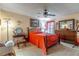 Comfortable bedroom with carpet, a ceiling fan, and neutral paint at 458 Meadowood Blvd, Fern Park, FL 32730