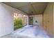 Covered carport area featuring storage, entryway to the home, and a cozy, sheltered space at 458 Meadowood Blvd, Fern Park, FL 32730