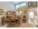 Charming dining area with chandelier and large windows for natural light at 458 Meadowood Blvd, Fern Park, FL 32730