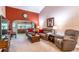 Cozy living room with comfortable seating, a stylish coffee table and accent lighting at 458 Meadowood Blvd, Fern Park, FL 32730