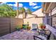 Enclosed brick patio featuring potted plants, garden decor, and providing a serene outdoor retreat at 458 Meadowood Blvd, Fern Park, FL 32730