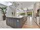 Spacious kitchen featuring a large island, modern appliances, and stylish pendant lighting at 5157 Latrobe Dr, Windermere, FL 34786