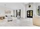 Bright living room with high ceilings, elegant decor, and decorative doors at 5157 Latrobe Dr, Windermere, FL 34786