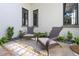 Outdoor patio area showcasing comfortable seating and manicured landscaping at 5157 Latrobe Dr, Windermere, FL 34786