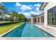Long swimming pool with in-ground hot tub and a spacious covered outdoor living space, great for entertaining at 5157 Latrobe Dr, Windermere, FL 34786